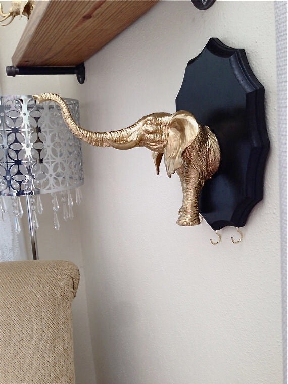 Items similar to Gold elephant jewelry organizer display necklace