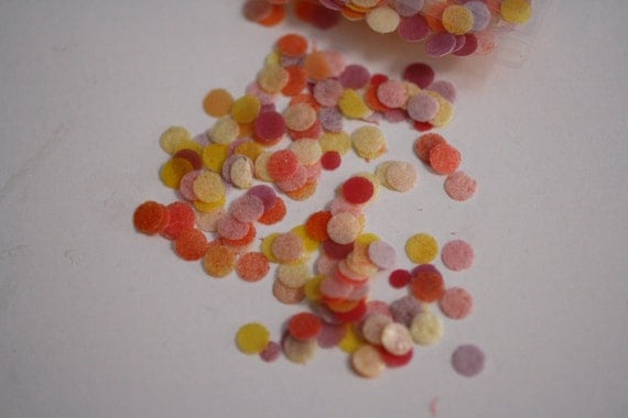 Yellow and red mini-dots edible confetti for cake decorating