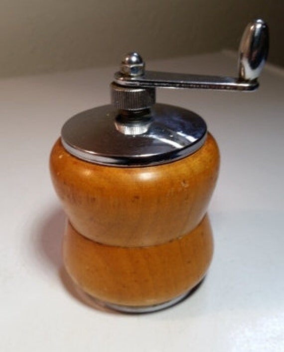 Vintage metal/wood crankstyle pepper grinder by Dee Kay