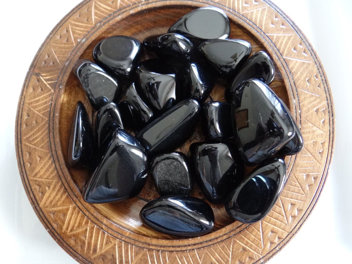 burgundy and black obsidian stone