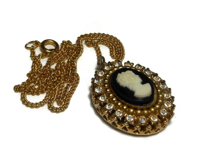 1950s Cameo rhinestone pendant, white on black celluloid, bezel set, surrounded by rhinestones, dimensional frame with chain, bride worthy