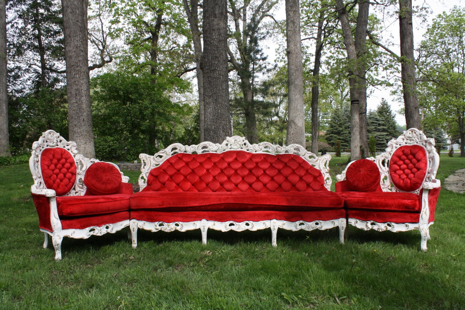 Victorian couch in red velvet upholstery fabric with painted wood trim