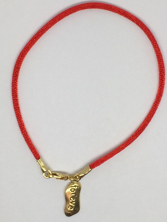 Items similar to Red string bracelet with gold "Forever " charm on Etsy