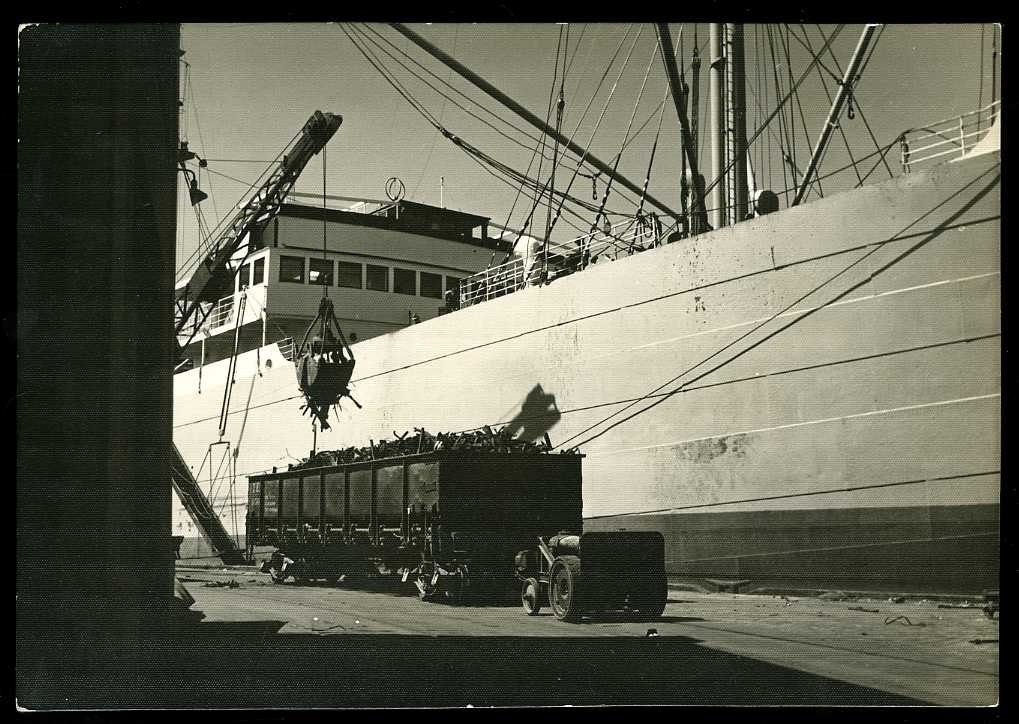 1940 Cargo ship yard crane unloading steel by VintagePhotosRus