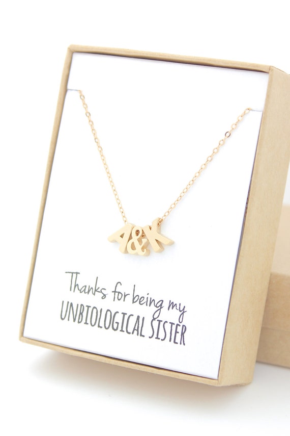 Gold tiny initial necklace (box photo)