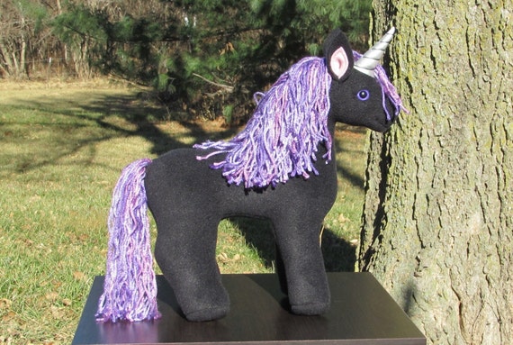 black stuffed unicorn