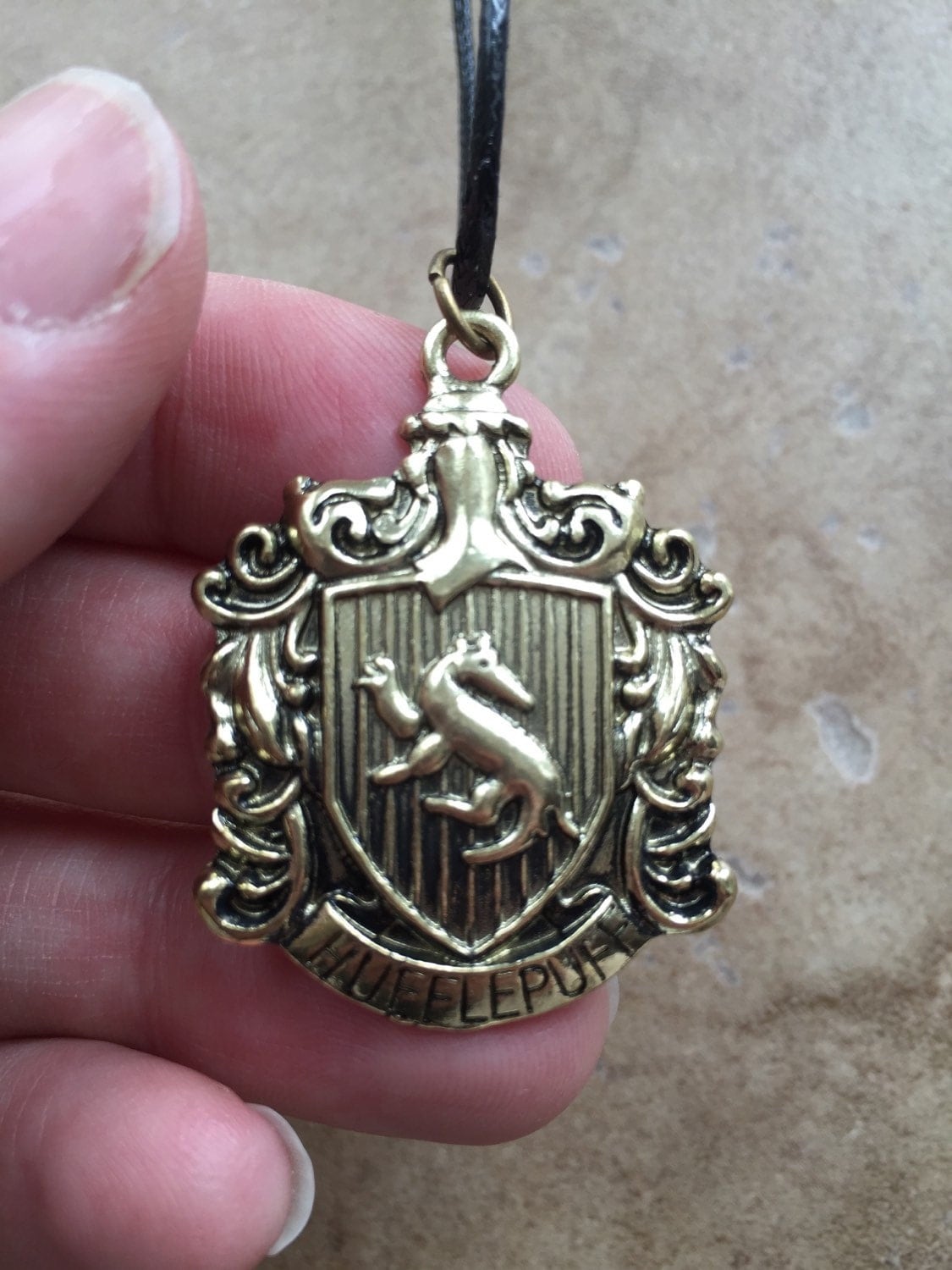 Hufflepuff house crest necklace inspired by by BilingualBunny