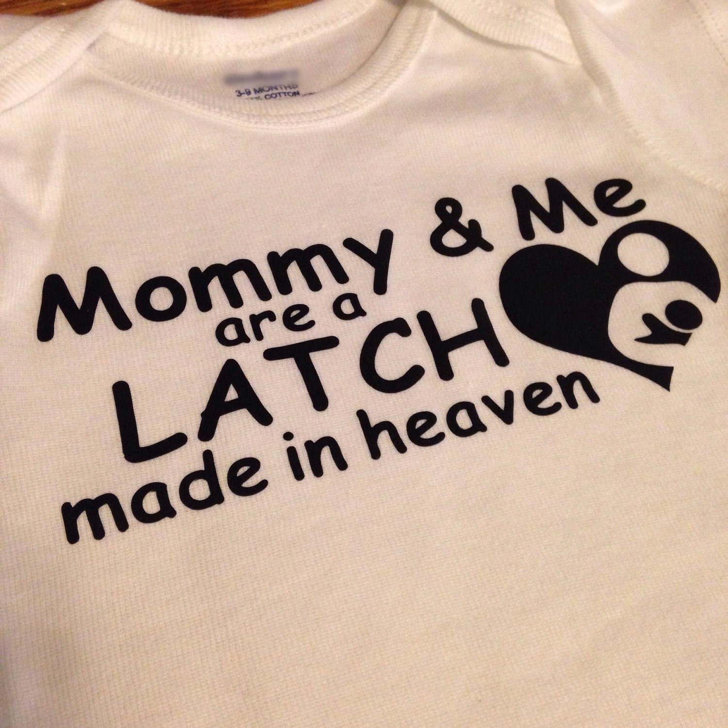 Mommy and Me Are A Latch Made In Heaven Baby Bodysuit