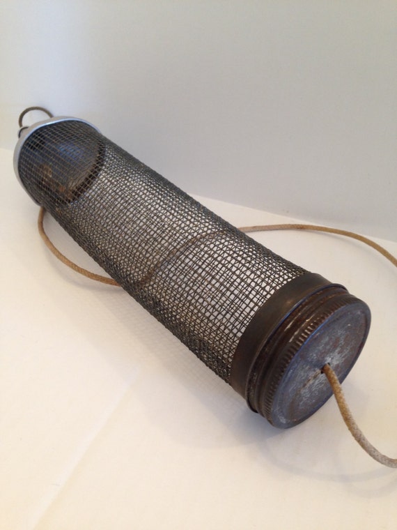 Vintage metal cricket tube for fishing bait cork top