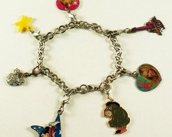 Storewide 25% Off SALE Beautiful Vintage Silver Tone Disney Charm Bracelet Featuring Seven Original Charms Each Marked Disney.