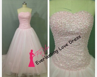 Items similar to Big peach bow back strapless ball gown wedding dress ...