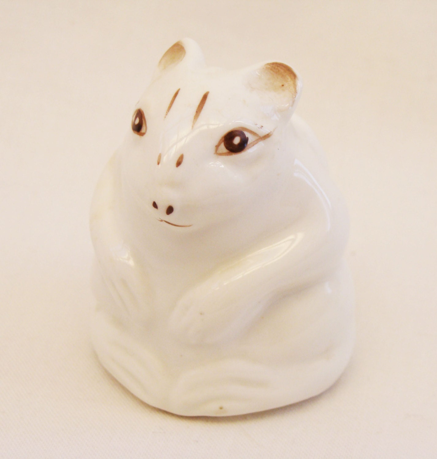 white mouse figurine