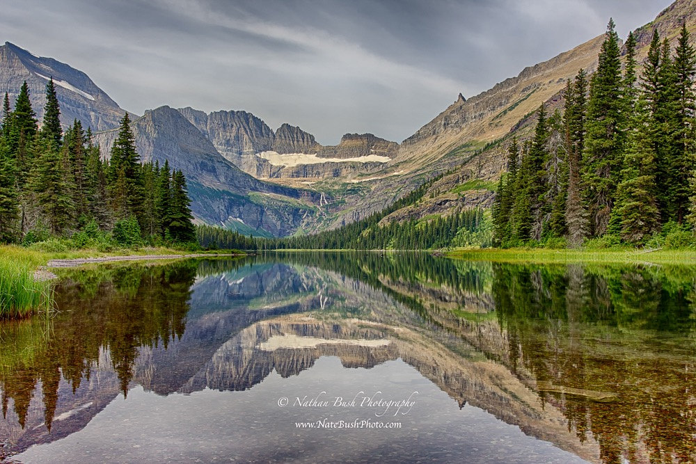 Nature's Mirror Lake Josephine Glacier National by NathanBushPhoto