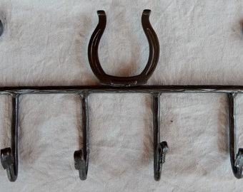 Handcrafted Coat Hooks with Horseshoe Stamping Above