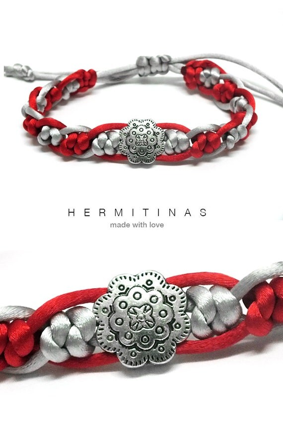 Silk cord bracelet with knots and metal beads in grey and red