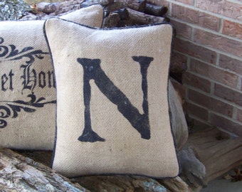 Hand stenciled initial burlap pillow
