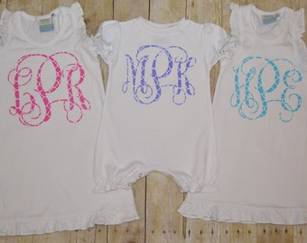 Ruffle tank dress with a vinyl vine monogram.