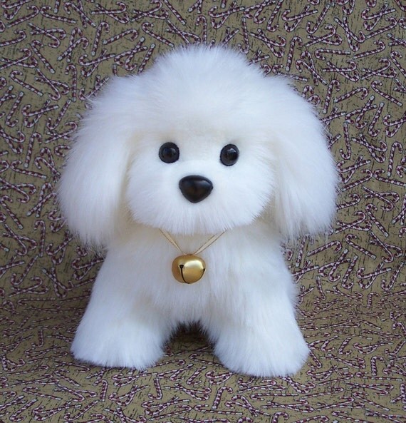 stuffed white puppy