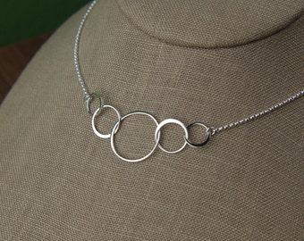 Items similar to Tiny Three Linked Circles in Gold, bridesmaid gift ...