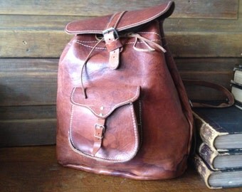 Items similar to Vintage X-Large Rust Leather Backpack / Rucksack on Etsy