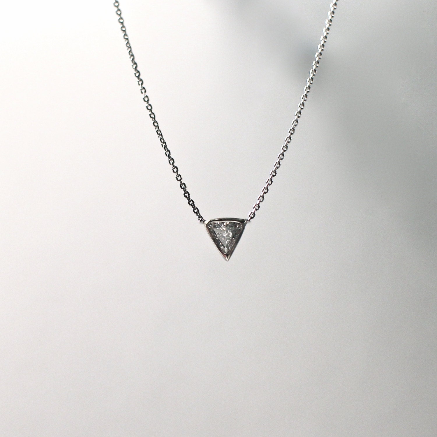Triangle cut diamond necklace .15 carats in gold