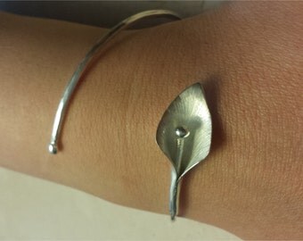 Silver bracelet, hammered with calla flower hand forged.