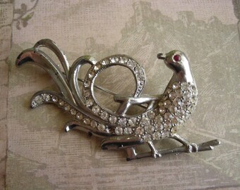 Items similar to RESERVED Vintage paste bird, 1930s 1940s pot metal and