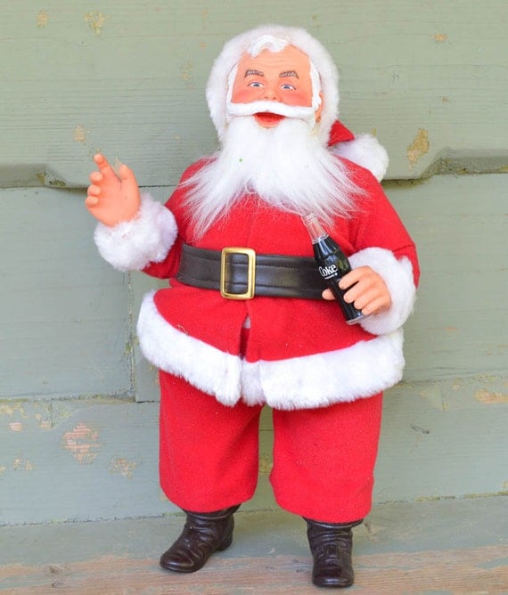 vintage stuffed santa holding coke bottle