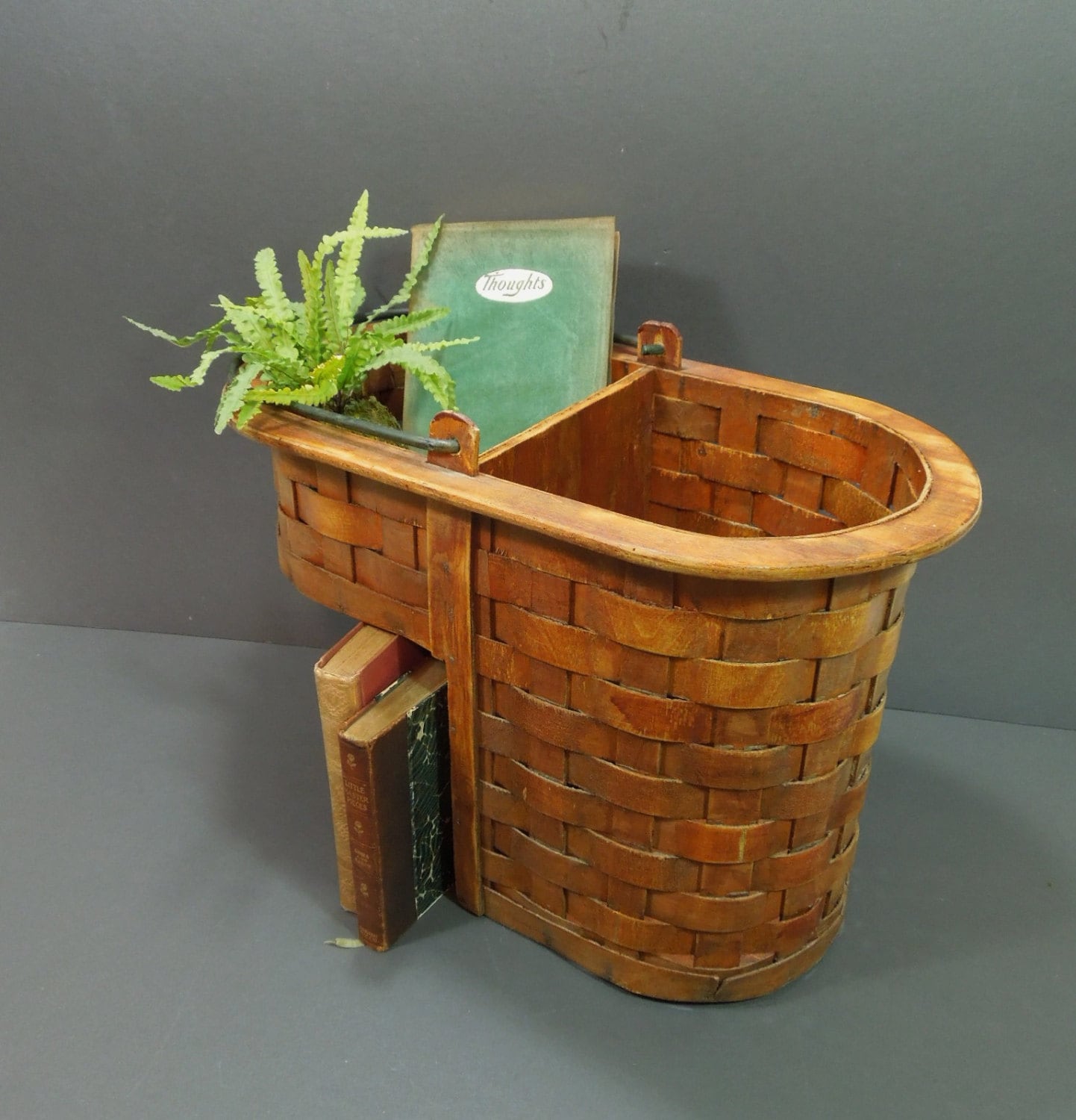 Woven wood Stair step basket with wrought metal handle. dark