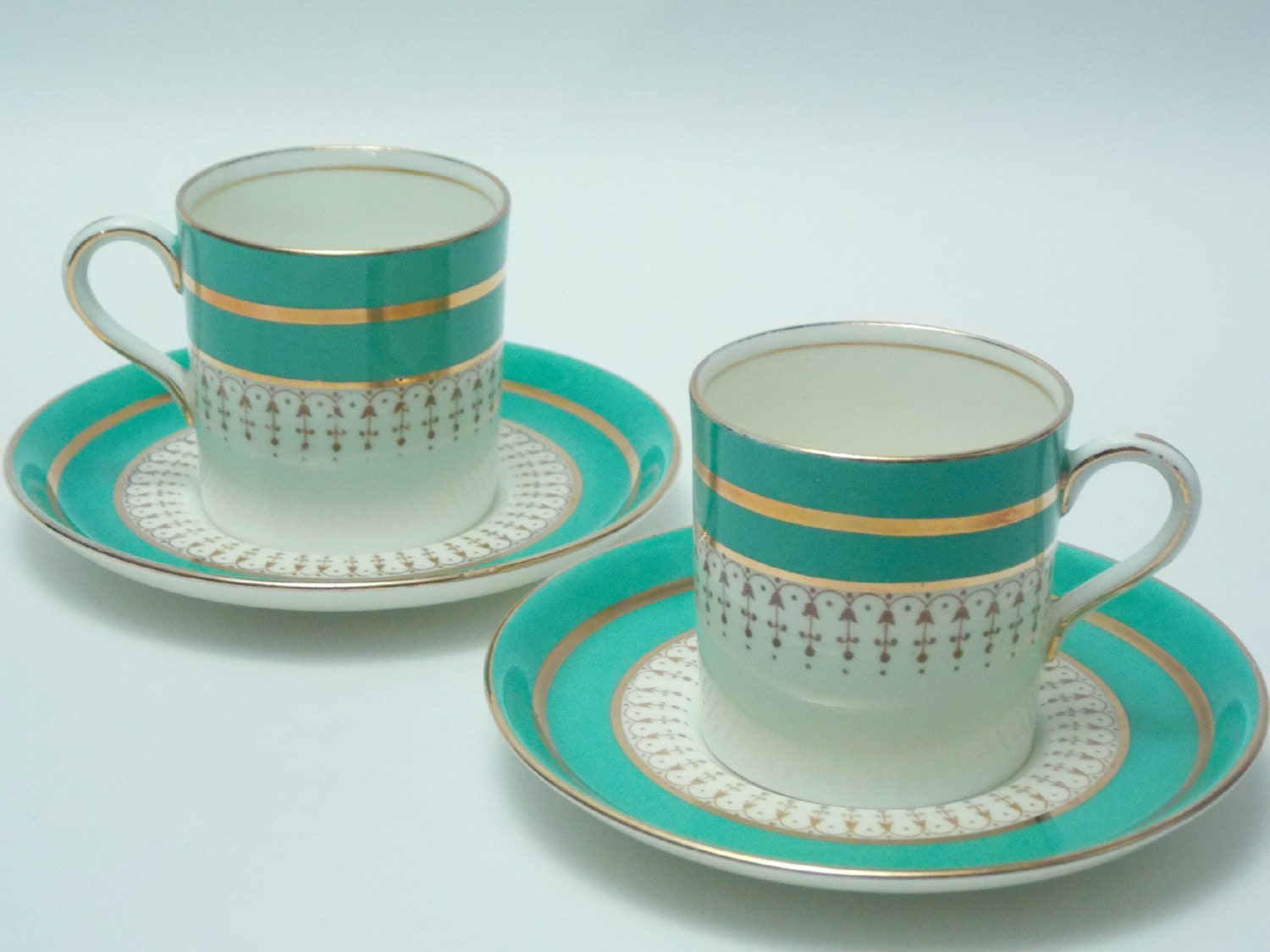 Two Aynsley Green Gold Brown Demitasse Cup and Saucers Vintage