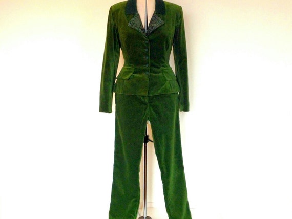 Luxurious rich moss green velvet ladies trouser suit in a UK