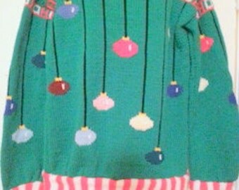 Knitting pattern Arthur Christmas Sweater in adult sizes.