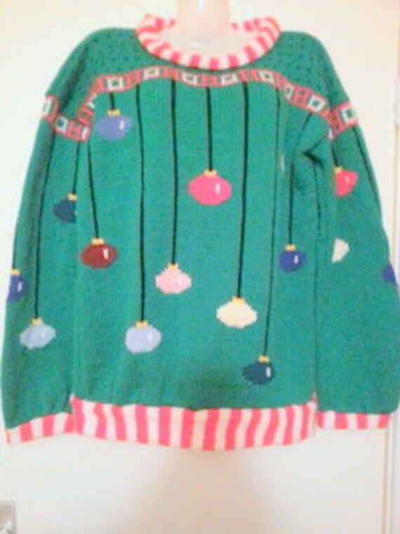 Knitting pattern Arthur Christmas Sweater in adult sizes.