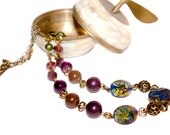 Necklace of lampwork beads, crystal and press charoite, glass and bronze metal. Long necklace