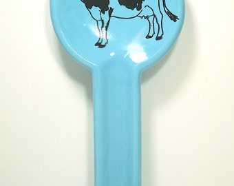 spoon rest in cloudless blue with a Holstein cow on it, made to order / pick your colour