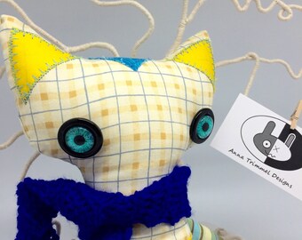 yellow cat stuffed animal