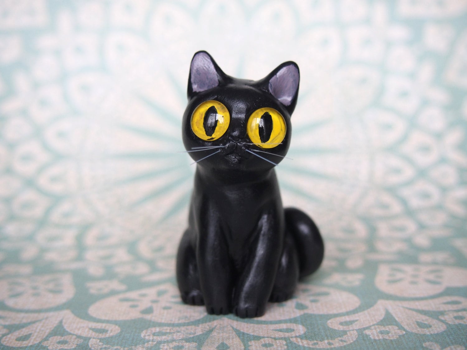 clay cat figurines