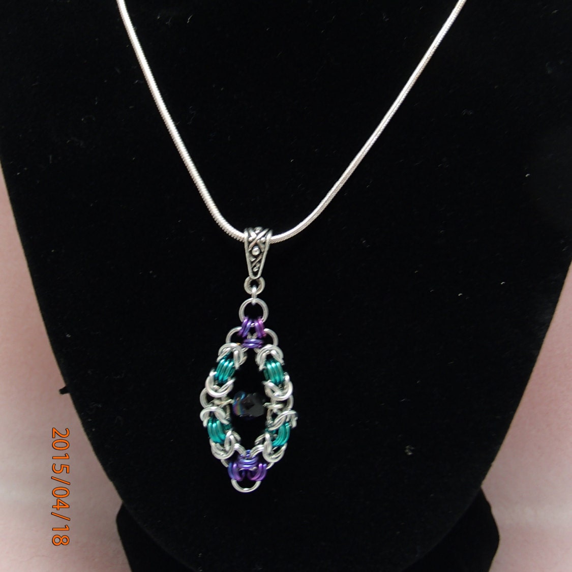 Floating Bead Pendant by RingsofElegance on Etsy