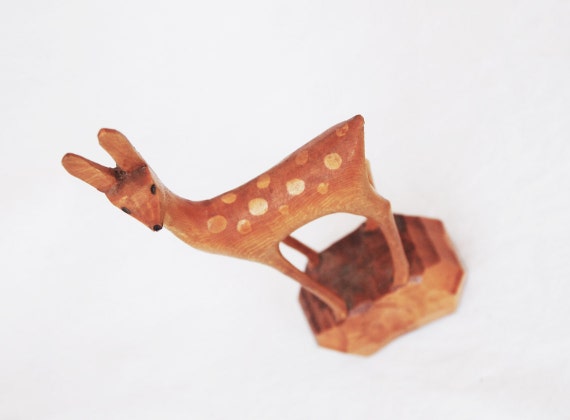 wooden deer figurine