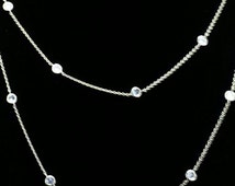 CD 26S CD LOGO CZ STATION NECKLACE IN GOLD TONE METAL 631851