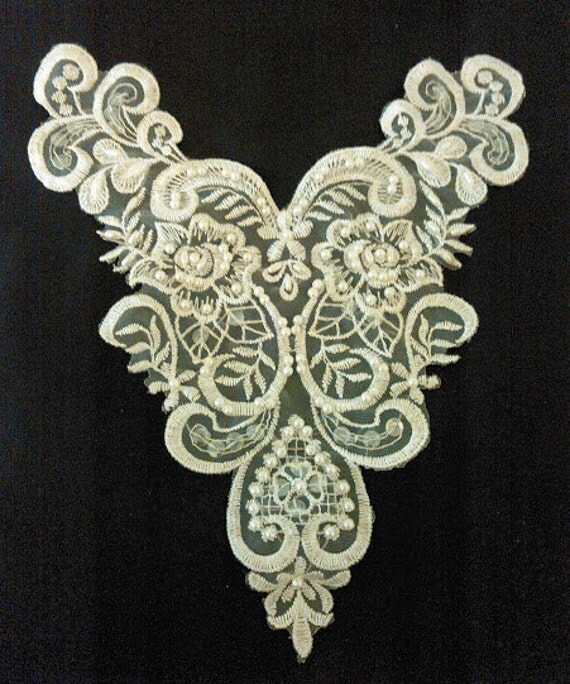 white beaded applique