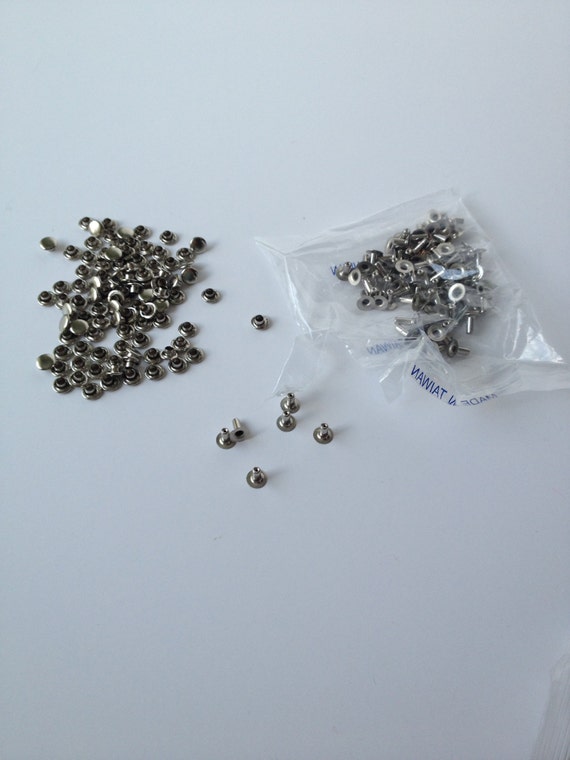 96 tiny nickel leather brads