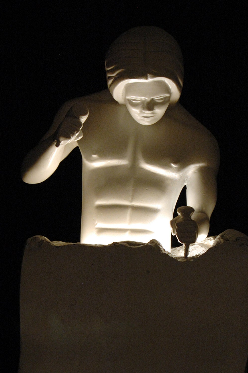 sculpture man sculpting himself lighted sculpture male