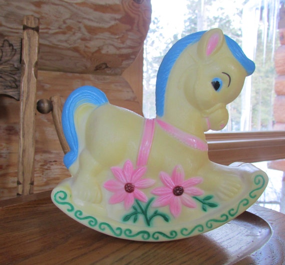 vintage plastic rocking horse