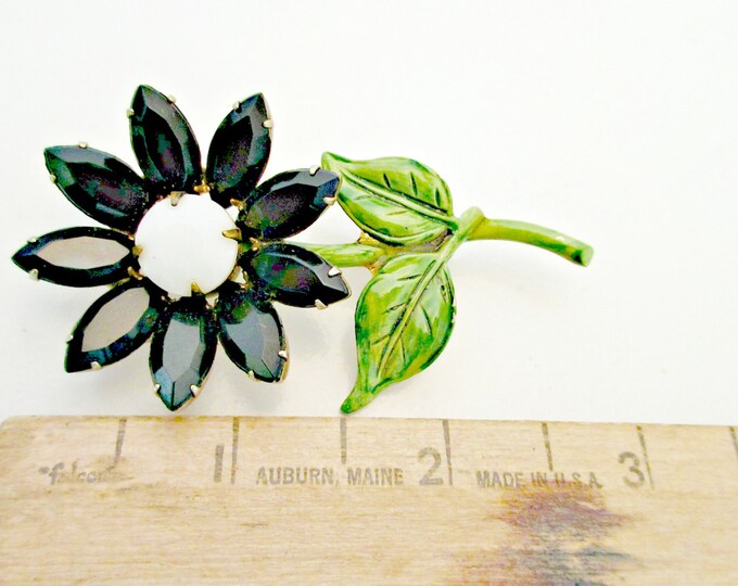 Flower Brooch with black and white glass and green enamel pin