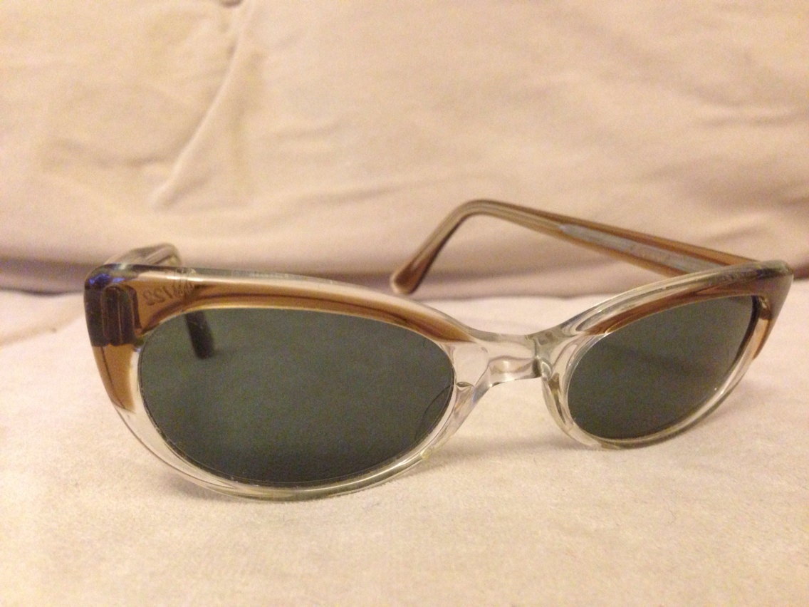 Brown Cateye sunglasses with grey tinted lenses with