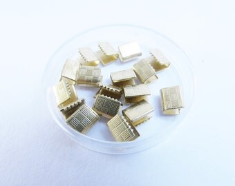 D-02076 - 20 Ribbon ends gold color nickel free 7x5,5mm