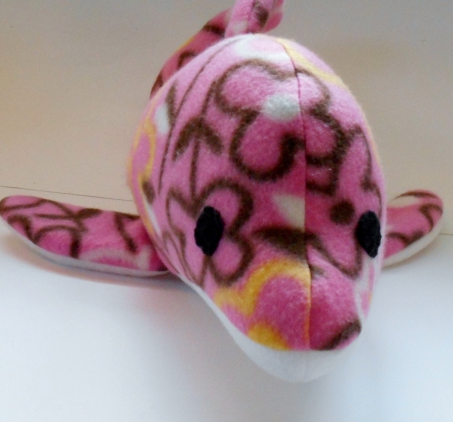 pink stuffed dolphin