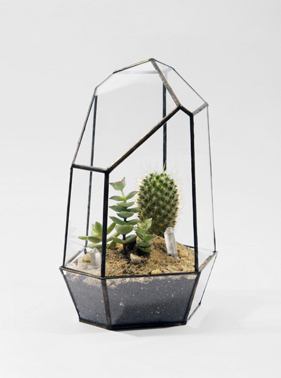 Unique stain glass terrariums. Catches sunlight and reflects an amazing spectrum Makes a beautiful gift or creative project for yourself