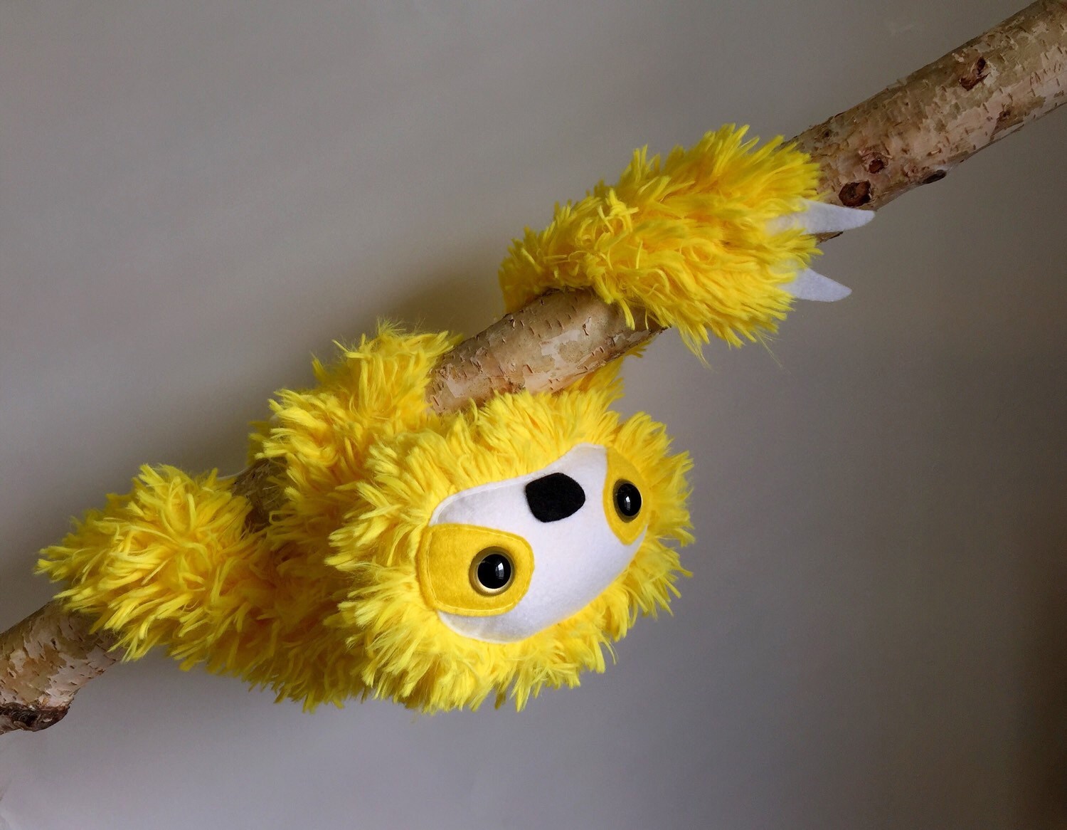 yellow sloth stuffed animal